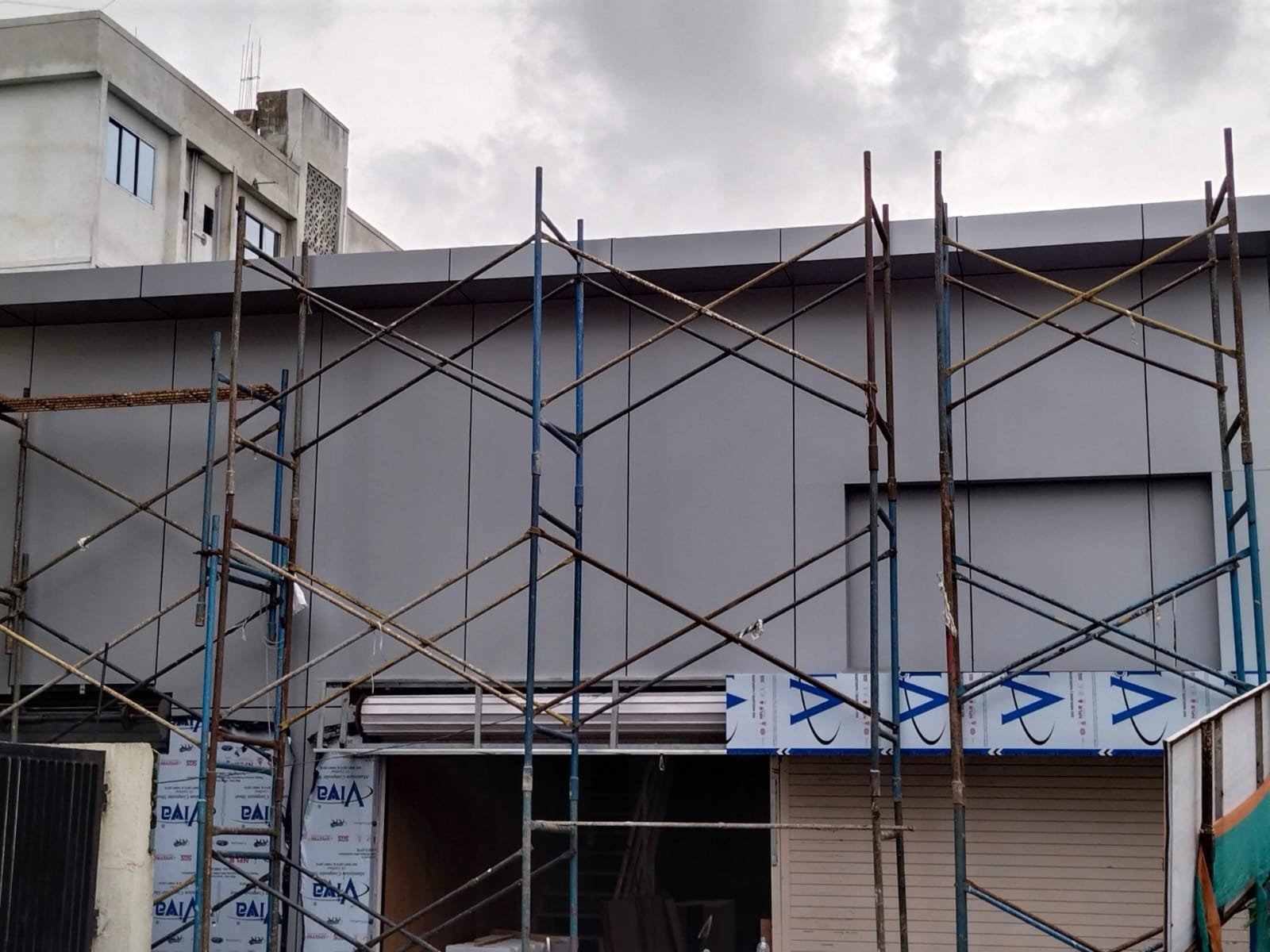Grey ACP cladding installation - commercial building Navi Mumbai